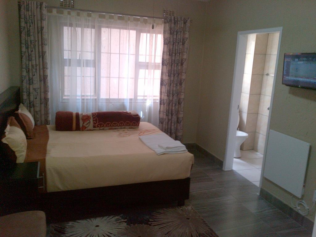 Chisam Guest Lodge Pty Ltd Johannesburg Rom bilde