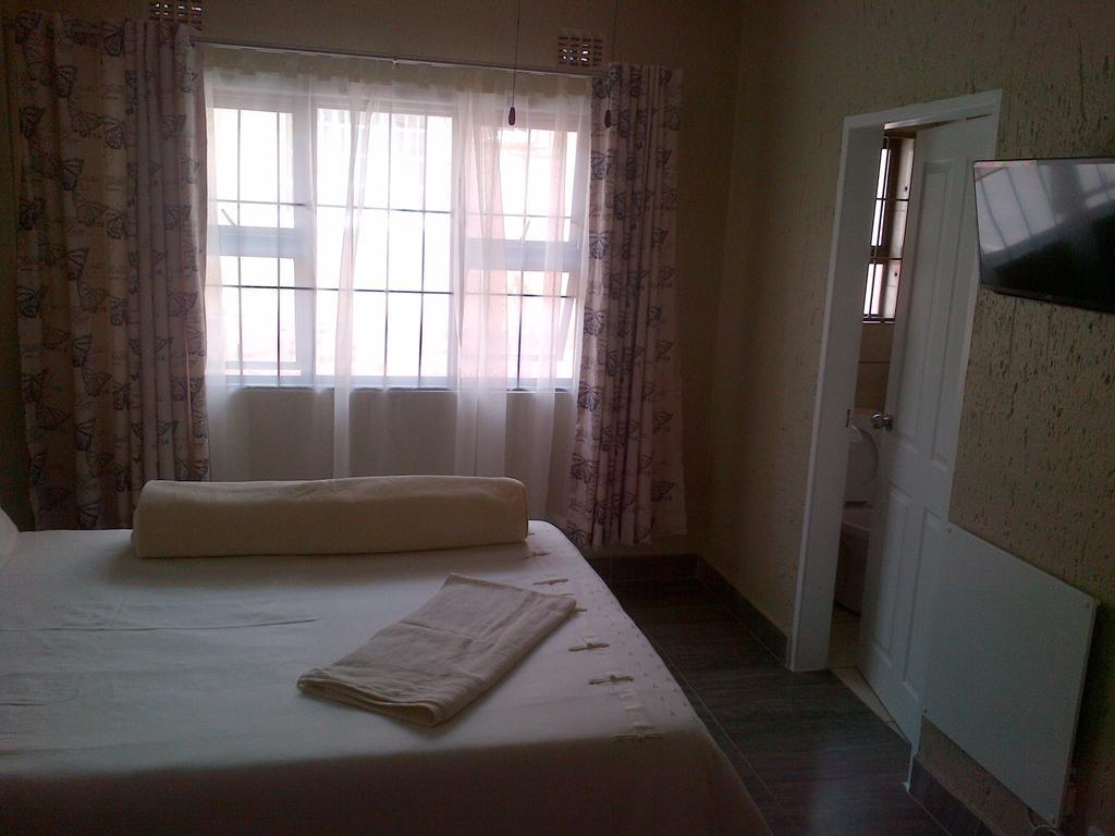 Chisam Guest Lodge Pty Ltd Johannesburg Rom bilde